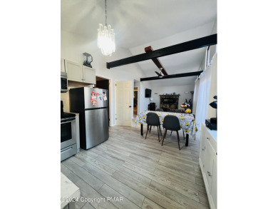 Come check out this UPDATED COZY CHALET/Raised Ranch with a on Pocono Farms Country Club in Pennsylvania - for sale on GolfHomes.com, golf home, golf lot