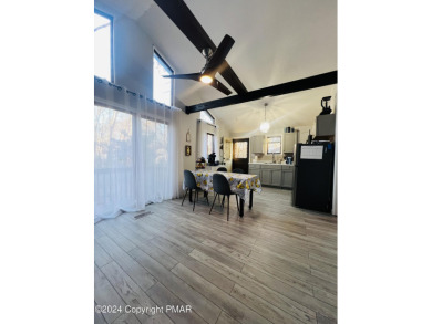 Come check out this UPDATED COZY CHALET/Raised Ranch with a on Pocono Farms Country Club in Pennsylvania - for sale on GolfHomes.com, golf home, golf lot