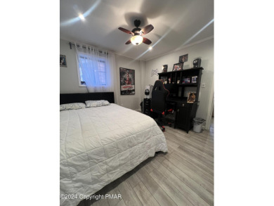 Come check out this UPDATED COZY CHALET/Raised Ranch with a on Pocono Farms Country Club in Pennsylvania - for sale on GolfHomes.com, golf home, golf lot