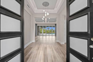 This exquisite residence, designed and built by the prestigious on Medalist Golf Club in Florida - for sale on GolfHomes.com, golf home, golf lot