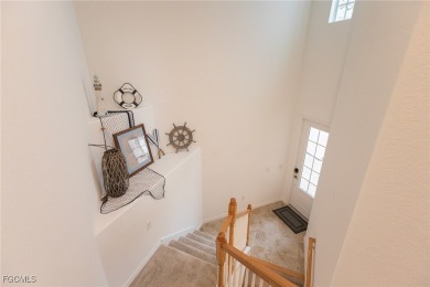 Step into resort living with this gorgeous upstairs Bay Creek on Heritage Landing Golf  in Florida - for sale on GolfHomes.com, golf home, golf lot