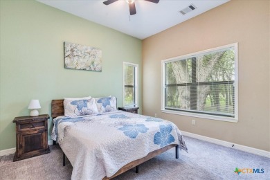 Welcome home to 302 Guadalupe River Drive, a custom waterfront on Golf Club of Seguin in Texas - for sale on GolfHomes.com, golf home, golf lot