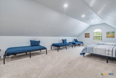 Welcome home to 302 Guadalupe River Drive, a custom waterfront on Golf Club of Seguin in Texas - for sale on GolfHomes.com, golf home, golf lot