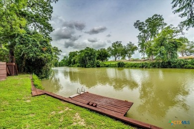 Welcome home to 302 Guadalupe River Drive, a custom waterfront on Golf Club of Seguin in Texas - for sale on GolfHomes.com, golf home, golf lot