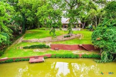 Welcome home to 302 Guadalupe River Drive, a custom waterfront on Golf Club of Seguin in Texas - for sale on GolfHomes.com, golf home, golf lot