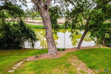 Welcome home to 302 Guadalupe River Drive, a custom waterfront on Golf Club of Seguin in Texas - for sale on GolfHomes.com, golf home, golf lot