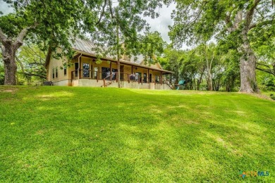 Welcome home to 302 Guadalupe River Drive, a custom waterfront on Golf Club of Seguin in Texas - for sale on GolfHomes.com, golf home, golf lot
