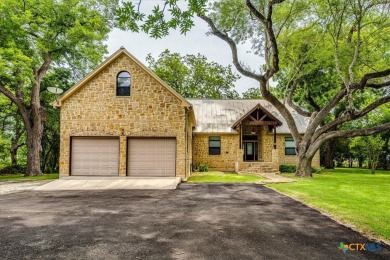 Welcome home to 302 Guadalupe River Drive, a custom waterfront on Golf Club of Seguin in Texas - for sale on GolfHomes.com, golf home, golf lot