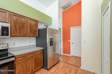 Welcome to this beautifully maintained 3-bedroom, 2-bath home on LPGA International Golf Course in Florida - for sale on GolfHomes.com, golf home, golf lot