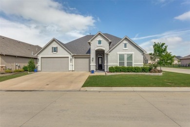 Discover the rare opportunity to own a two-story Ashland model on Wildhorse Golf Club of Robson Ranch in Texas - for sale on GolfHomes.com, golf home, golf lot