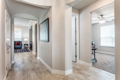 Discover the rare opportunity to own a two-story Ashland model on Wildhorse Golf Club of Robson Ranch in Texas - for sale on GolfHomes.com, golf home, golf lot