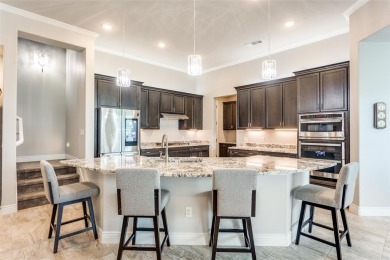 Discover the rare opportunity to own a two-story Ashland model on Wildhorse Golf Club of Robson Ranch in Texas - for sale on GolfHomes.com, golf home, golf lot