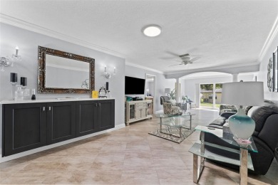 Welcome to easy living in this beautiful, spacious 2-bedroom on Highland Lakes Executive Golf Course in Florida - for sale on GolfHomes.com, golf home, golf lot