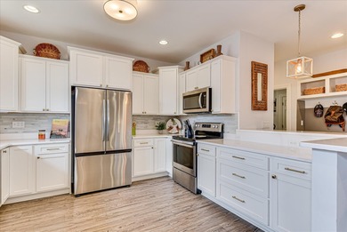 From the moment you step inside 121 Troon Way, the impact is on Houndslake Country Club in South Carolina - for sale on GolfHomes.com, golf home, golf lot