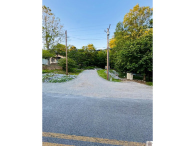 Discover an exceptional opportunity to build your dream home on Mineral Mound Golf Course in Kentucky - for sale on GolfHomes.com, golf home, golf lot