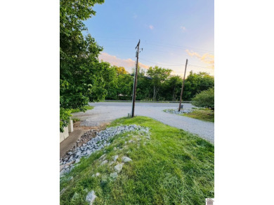 Discover an exceptional opportunity to build your dream home on Mineral Mound Golf Course in Kentucky - for sale on GolfHomes.com, golf home, golf lot