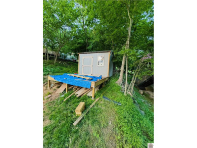 Discover an exceptional opportunity to build your dream home on Mineral Mound Golf Course in Kentucky - for sale on GolfHomes.com, golf home, golf lot