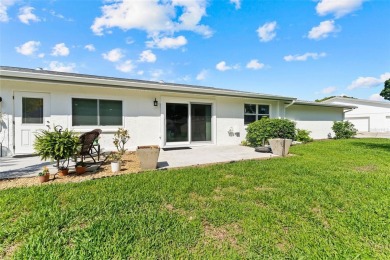 Welcome to easy living in this beautiful, spacious 2-bedroom on Highland Lakes Executive Golf Course in Florida - for sale on GolfHomes.com, golf home, golf lot