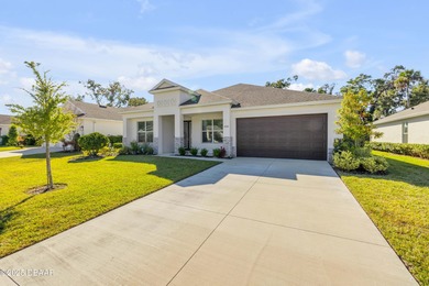 Discover this 4-bed, 3-bath home in Halifax Plantation with 2 on Halifax Plantation Golf Club in Florida - for sale on GolfHomes.com, golf home, golf lot
