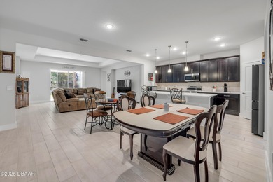 Discover this 4-bed, 3-bath home in Halifax Plantation with 2 on Halifax Plantation Golf Club in Florida - for sale on GolfHomes.com, golf home, golf lot