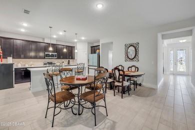 Discover this 4-bed, 3-bath home in Halifax Plantation with 2 on Halifax Plantation Golf Club in Florida - for sale on GolfHomes.com, golf home, golf lot