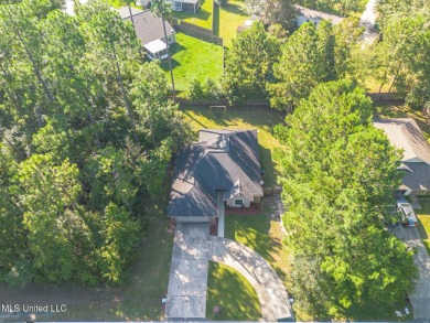 Located in the heart of Diamondhead, this 3-bedroom, 2-bath home on Diamondhead Country Club in Mississippi - for sale on GolfHomes.com, golf home, golf lot