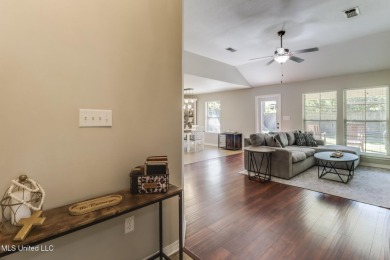 Located in the heart of Diamondhead, this 3-bedroom, 2-bath home on Diamondhead Country Club in Mississippi - for sale on GolfHomes.com, golf home, golf lot
