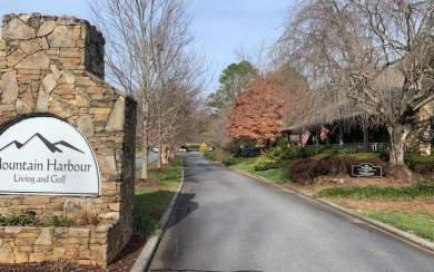 GOLF COURSE FRONT LOT IN GATED GOLF COURSE COMMUNITY IN THE on Chatuge Shores Golf Course in North Carolina - for sale on GolfHomes.com, golf home, golf lot