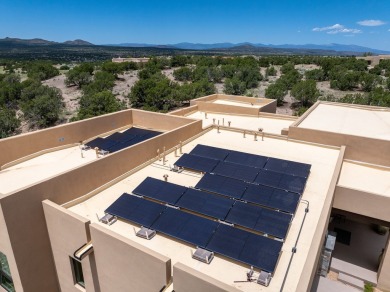 This recently constructed, open concept design residence on The Club At Las Campanas  in New Mexico - for sale on GolfHomes.com, golf home, golf lot