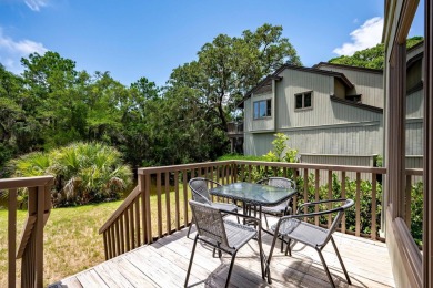 This beautifully updated end-unit 3BR/3BA Fairway Oaks villa on Kiawah Island Resort - Cougar Point in South Carolina - for sale on GolfHomes.com, golf home, golf lot