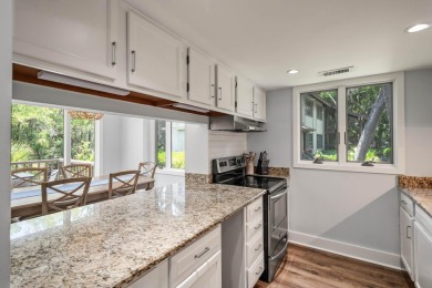 This beautifully updated end-unit 3BR/3BA Fairway Oaks villa on Kiawah Island Resort - Cougar Point in South Carolina - for sale on GolfHomes.com, golf home, golf lot