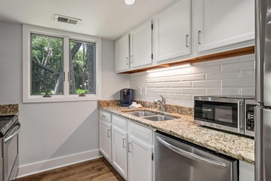 This beautifully updated end-unit 3BR/3BA Fairway Oaks villa on Kiawah Island Resort - Cougar Point in South Carolina - for sale on GolfHomes.com, golf home, golf lot