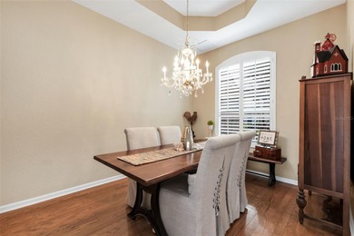 Don't miss this beautifully updated 4-bedroom, 3-bath pool home on Riverwood Golf Club in Florida - for sale on GolfHomes.com, golf home, golf lot