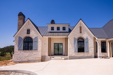 NEW CONSTRUCTION BY AGAVE CUSTOM HOMES! This gorgeous French on The Club At Comanche Trace in Texas - for sale on GolfHomes.com, golf home, golf lot