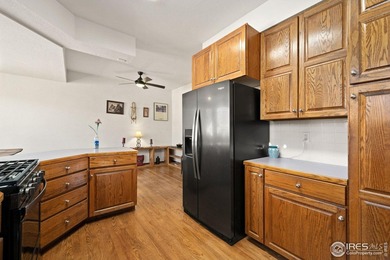 All-brick charmer on a cul-de-sac! This gorgeous home in the on The Olde Course At Loveland in Colorado - for sale on GolfHomes.com, golf home, golf lot