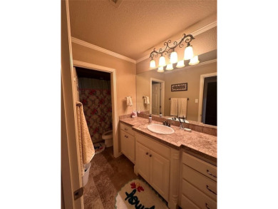 Beautiful home in coveted Pecan Plantation.  Open floor plan on Pecan Plantation Country Club in Texas - for sale on GolfHomes.com, golf home, golf lot