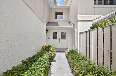 Welcome to this beautifully updated 2-bedroom condo with a on Jonathans Landing Golf Club in Florida - for sale on GolfHomes.com, golf home, golf lot