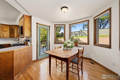 All-brick charmer on a cul-de-sac! This gorgeous home in the on The Olde Course At Loveland in Colorado - for sale on GolfHomes.com, golf home, golf lot