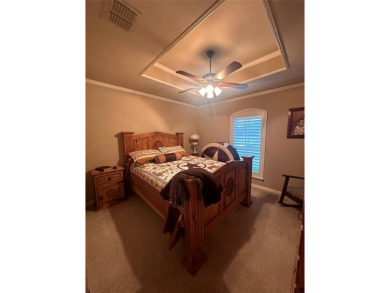 Beautiful home in coveted Pecan Plantation.  Open floor plan on Pecan Plantation Country Club in Texas - for sale on GolfHomes.com, golf home, golf lot