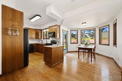 All-brick charmer on a cul-de-sac! This gorgeous home in the on The Olde Course At Loveland in Colorado - for sale on GolfHomes.com, golf home, golf lot