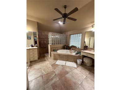 Beautiful home in coveted Pecan Plantation.  Open floor plan on Pecan Plantation Country Club in Texas - for sale on GolfHomes.com, golf home, golf lot