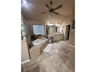 Beautiful home in coveted Pecan Plantation.  Open floor plan on Pecan Plantation Country Club in Texas - for sale on GolfHomes.com, golf home, golf lot