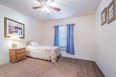 Welcome to this WELL MAINTAINED, ONE OWNER, four-bedroom on Sherman Hills Golf Club in Florida - for sale on GolfHomes.com, golf home, golf lot