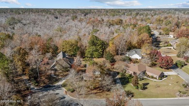 Welcome to 104 Jura Court in New Bern! Tucked away on a quiet on Taberna Country Club in North Carolina - for sale on GolfHomes.com, golf home, golf lot