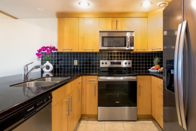 Enjoy a stunning setting with expansive views of the beautifully on Waikoloa Village Golf Club in Hawaii - for sale on GolfHomes.com, golf home, golf lot