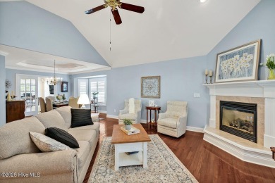 Enjoy serene pond views with this stunning brick home located in on Cape Fear National At Brunswick Forest in North Carolina - for sale on GolfHomes.com, golf home, golf lot