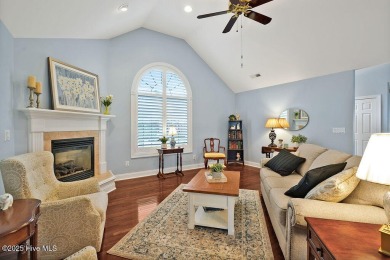 Enjoy serene pond views with this stunning brick home located in on Cape Fear National At Brunswick Forest in North Carolina - for sale on GolfHomes.com, golf home, golf lot