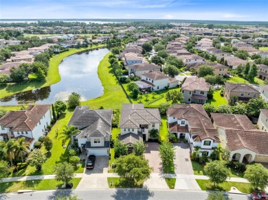 This beautifully maintained Jones Homes residence in the gated on Eagle Creek Golf Club in Florida - for sale on GolfHomes.com, golf home, golf lot