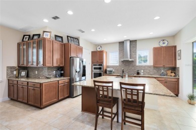 This beautifully maintained Jones Homes residence in the gated on Eagle Creek Golf Club in Florida - for sale on GolfHomes.com, golf home, golf lot