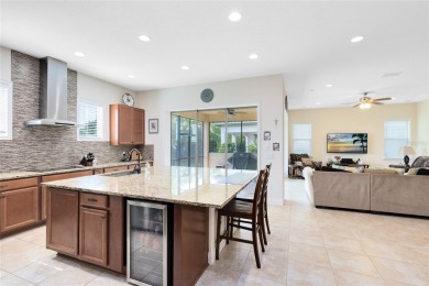 This beautifully maintained Jones Homes residence in the gated on Eagle Creek Golf Club in Florida - for sale on GolfHomes.com, golf home, golf lot